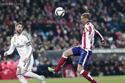 Torres returns as Atletico beat Real Madrid 2-0 in Copa del Rey