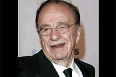 Murdoch heckled after top honours