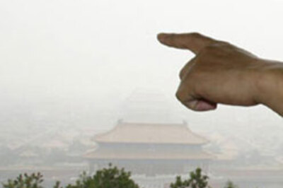 Beijing shrouded in haze 11 days before Olympics