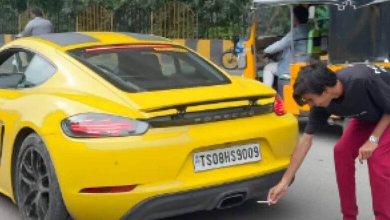 Man Tries To Light Cigarette With Porsche's Exhaust, Burns Hand | Video