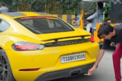 Man Tries To Light Cigarette With Porsche's Exhaust, Burns Hand | Video