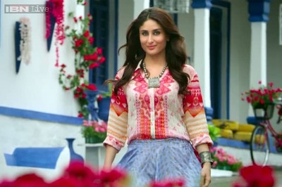 A hero's heroine: Kareena Kapoor in 'Singham Returns' doesn't blush, eats to her heart's content and doesn't need to be saved
