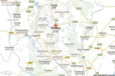 Bangladesh factory collapse traps about 100 workers; four dead