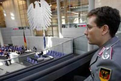 German troops play with human skull