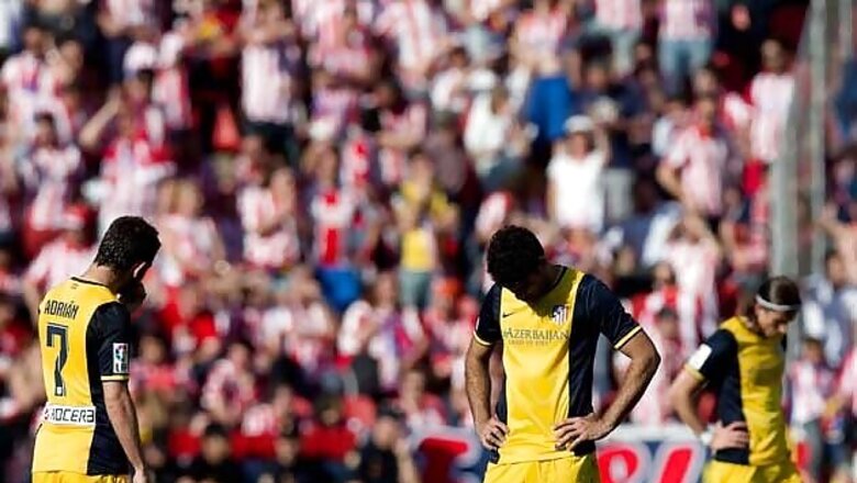 Atletico Madrid's loss at Levante tightens title race