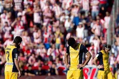 Atletico Madrid's loss at Levante tightens title race
