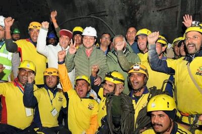 Dhami Honours Rat-hole Miners, Hands Them Cheques of Rs 50,000 Each