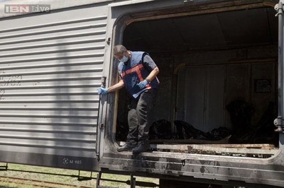 MH17: Refrigerated train with plane crash bodies leaves Ukraine town