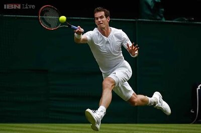 Andy Murray opens Wimbledon defence with a win over David Goffin