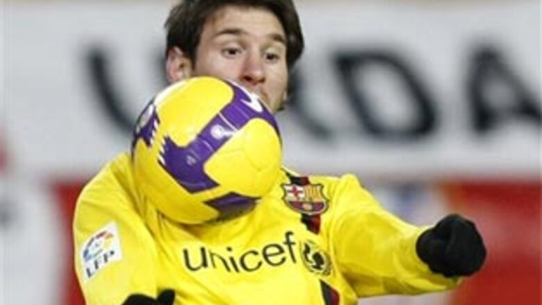 Messi hat-trick sees Barcelona past Atletico Madrid