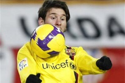 Messi hat-trick sees Barcelona past Atletico Madrid