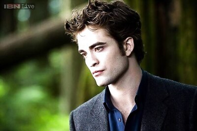 Robert Pattinson spotted with mystery woman