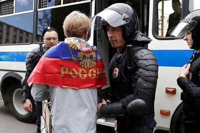 Russian Police Detain Putin Critic Navalny, Scores of Protesters Held