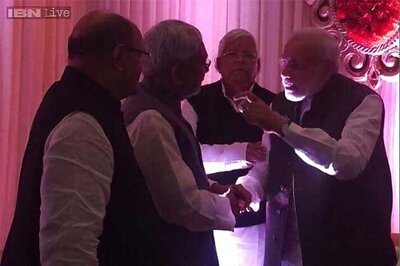 PM Modi meets Bihar CM Nitish Kumar at wedding of Lalu's daughter and Mulayam's grand nephew