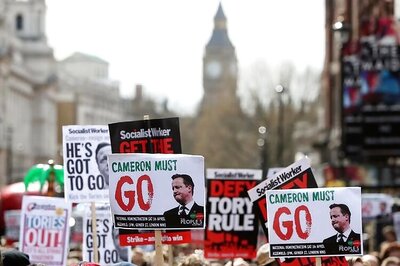 Thousands march in London demanding Cameron resignation
