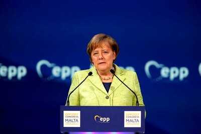 Angela Merkel Optimistic About Electric Car Future, to Invest More