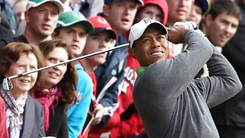 Woods plays down rivalry with good friend McIlroy