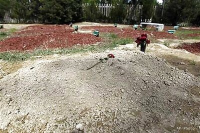 To bust myths, superstition, Karnataka Minister spends night at crematorium