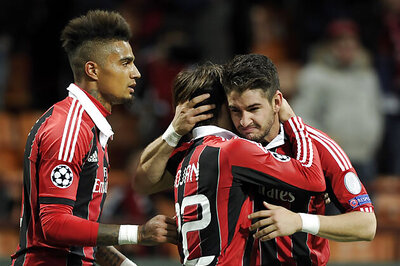 Malaga into knockout stage despite a draw with Milan