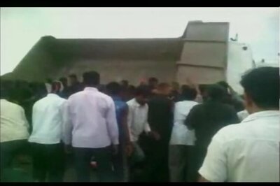 Armymen lift truck with their bare hands, rescue a man trapped under it