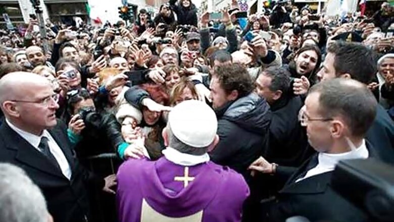 Pope Francis wades into crowds, surprising onlookers