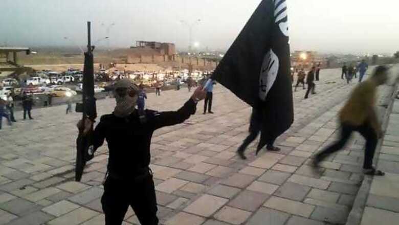 Iraq insurgents seize oilfields, hit air base as US advisers arrive