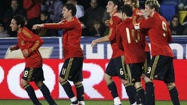 Solid Spain score three past Chile