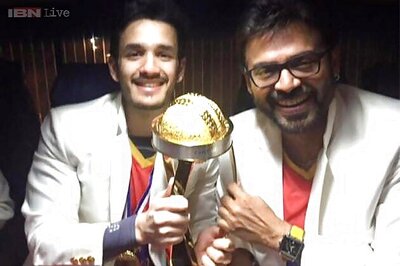 Snapshot: Young Akhil Akkineni poses with Venkatesh and Telugu Warriors' new Celebrity Cricket League trophy