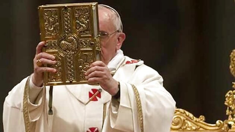 Pope presides over trimmed Easter Vigil service
