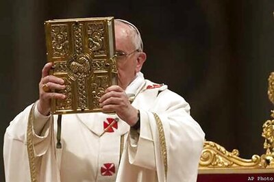 Pope presides over trimmed Easter Vigil service