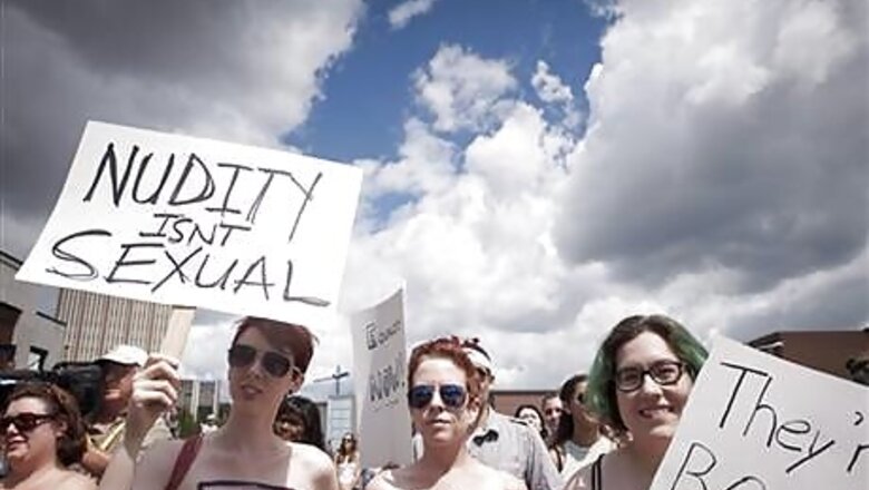 Hundreds in Canada rally for women's topless rights