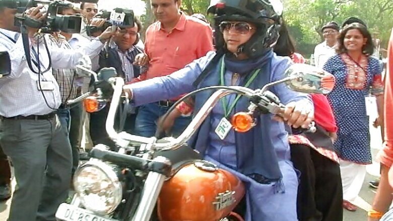 Woman MP rides on Harley-Davidson to Parliament on Women's Day