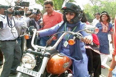 Woman MP rides on Harley-Davidson to Parliament on Women's Day