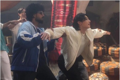 BTS: Jungkook Spotted Shooting in Qatar, Makes Heart Gestures and Waves to Fans