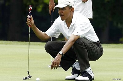 Barack Obama plays golf with Tiger Woods