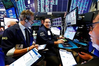 Global Stocks Mixed After Wall Street Rises On Dealmaking