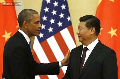 US, China sign symbolic emissions plan, play down rivalry