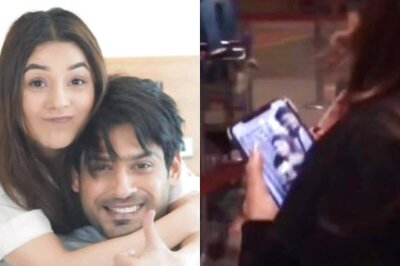 Shehnaaz Gill's CellPhone's Wallpaper is a Cute Picture with Sidharth Shukla