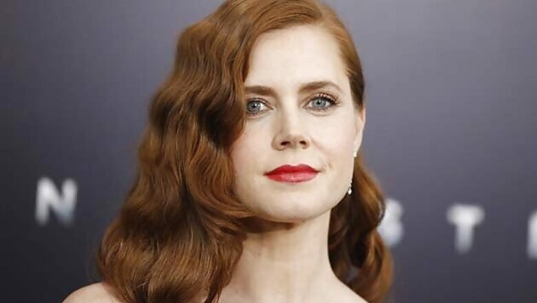 Amy Adams breaks down while talking about Philip Seymour Hoffman