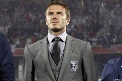 Victoria stands by David Beckham during sex scandal