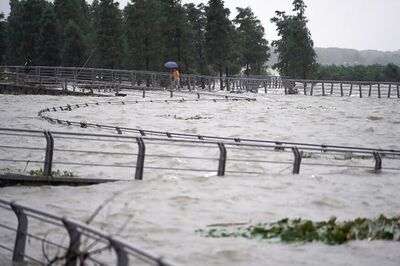 Residents at China's Giant Lake Remain Unfazed as Rainfall Continues to Break Records