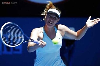 Sharapova survives heat, enters round three at Melbourne Park