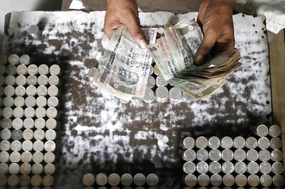 Rupee Softens 8 Paise Against Dollar in Early Trade