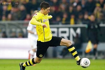 Lewandowski scores twice as Dortmund win 4-2 at Zenit in Champions League