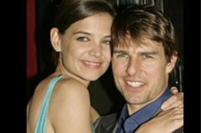 Katie Holmes confesses weekly to Tom Cruise