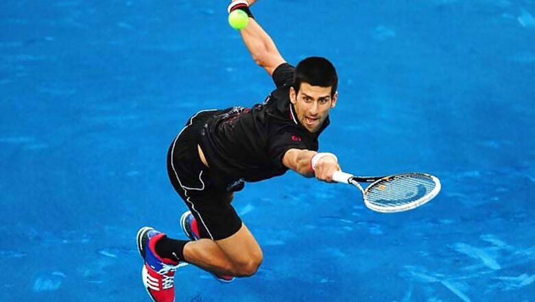 Djokovic slams blue clay after opening win