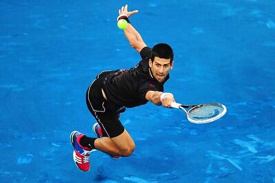 Djokovic slams blue clay after opening win