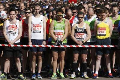 Big crowds, black ribbons for Boston at London Marathon
