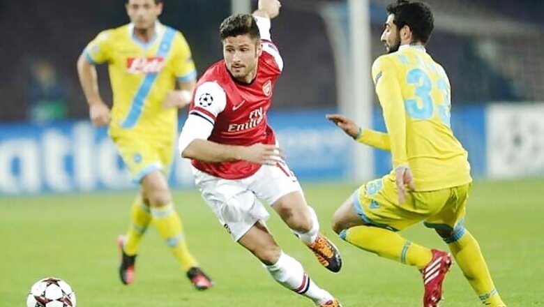 Arsenal advance despite 2-0 loss at Napoli in Champions League