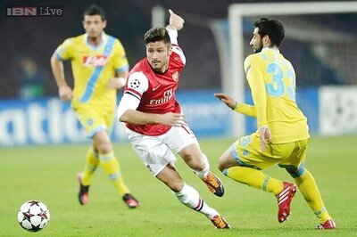 Arsenal advance despite 2-0 loss at Napoli in Champions League